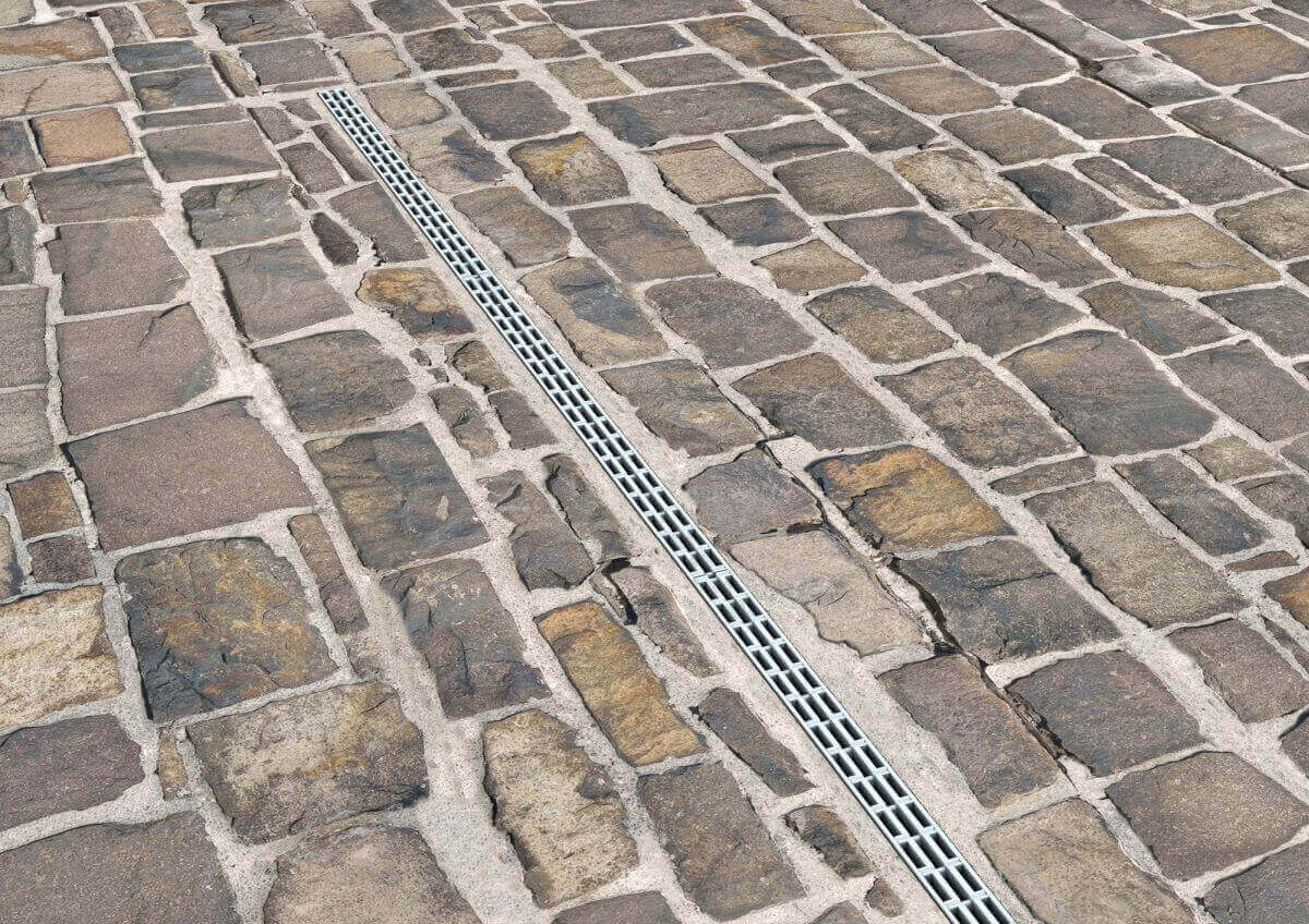 Grelha UCan, resistente e funcional. Indicada para escoamento eficiente de águas pluviais.